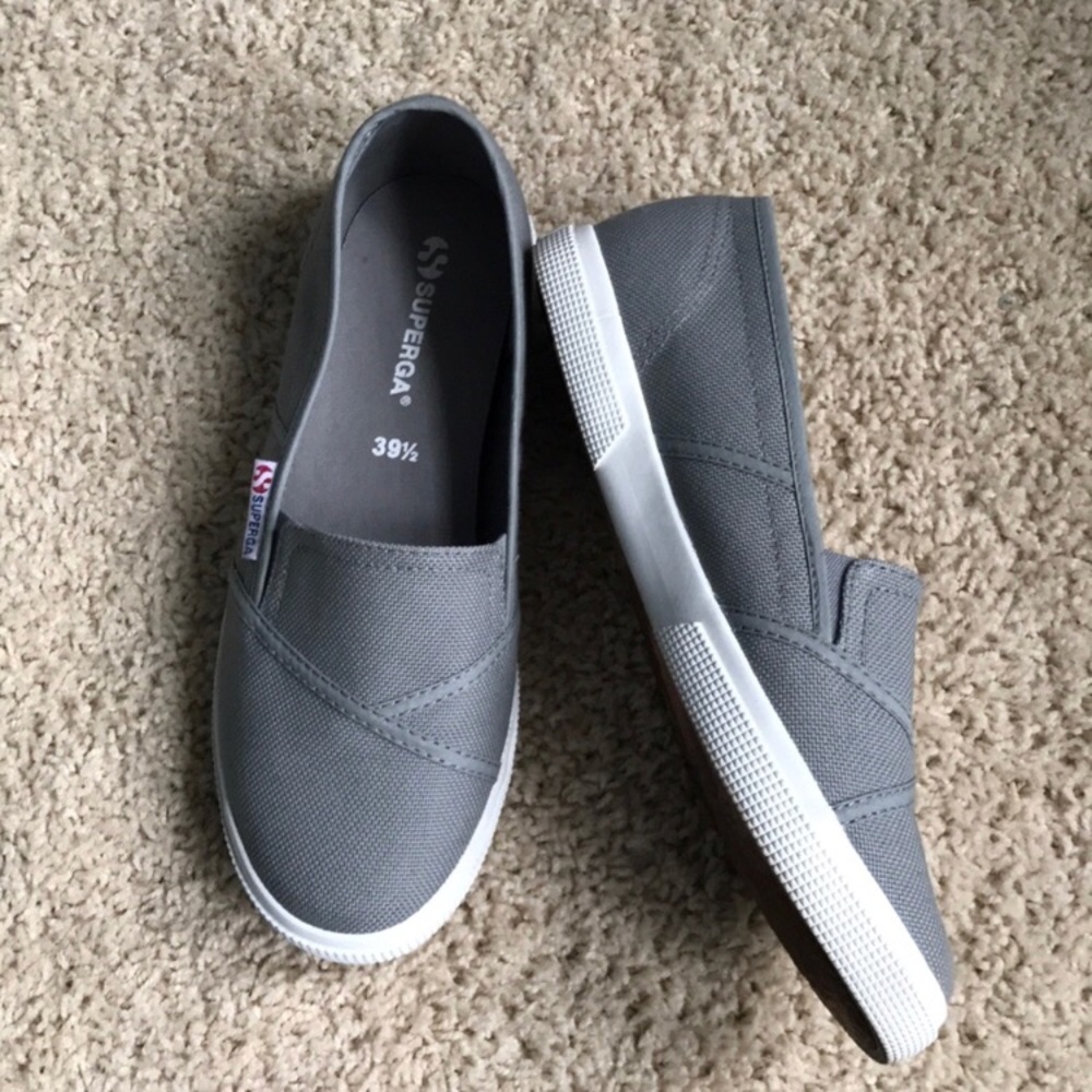 Gray Superga slip ons.